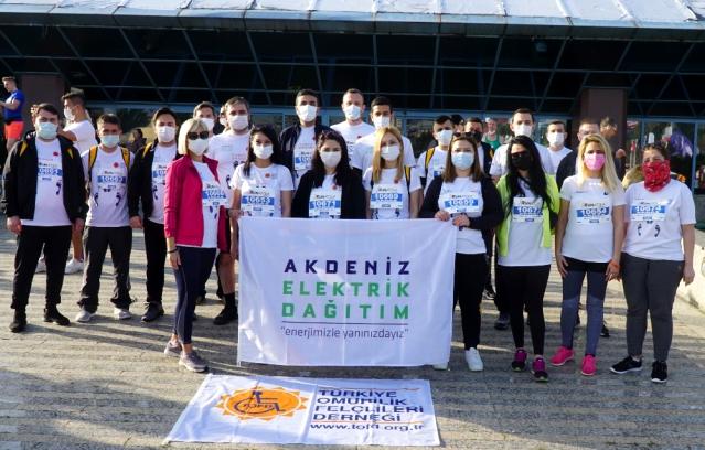 AEDAŞ çalışanları, Runatolia Maratonu'nda omurilik felçlileri için koştu