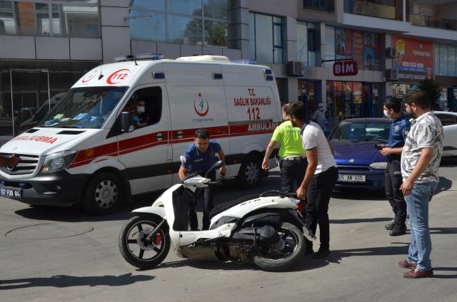 Antalya'da otomobil ile çarpışan motosikletin sürücüsü yaralandı