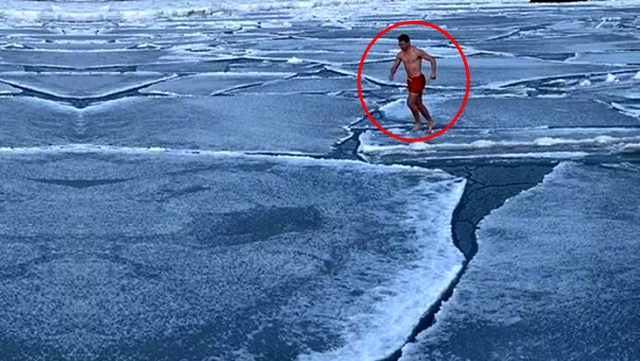Çılgın Norveçli, Arktik Okyanusu'ndaki buzullara aldırmadan şortuyla yüzüyor